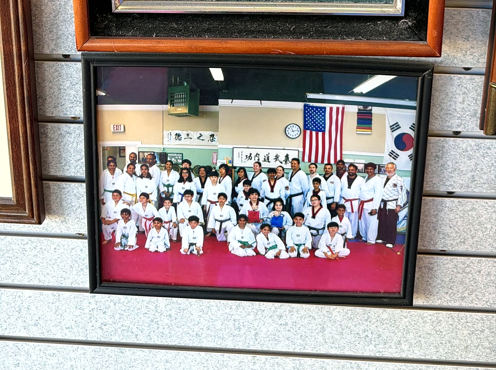 KIMOO students and instructors on the mat