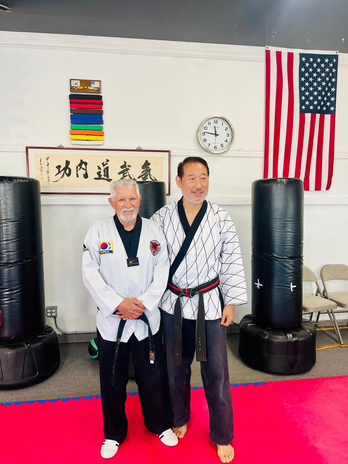 Grand Master Hwang with a fellow master in the dojang